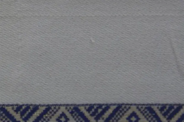 Housse de coussin Tribu Bleu avec Tibeb majoritairement en coton éthiopien, tissée artisanalement