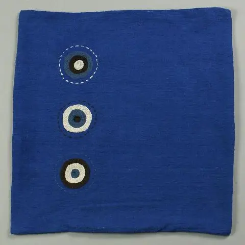 Housse de coussin Sphère Marine en coton éthiopien filé, tissée et brodée à la main